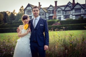 a man and woman standing outside